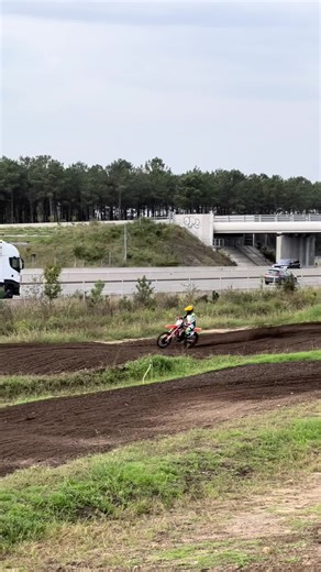 Motocross Rider Performs Amazing Jumps on Dirt Track
