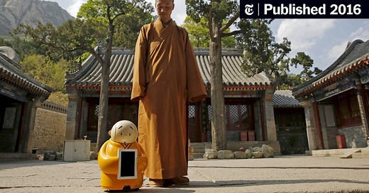 A Robot Monk Captivates China, Mixing Spirituality With Artificial Intelligence