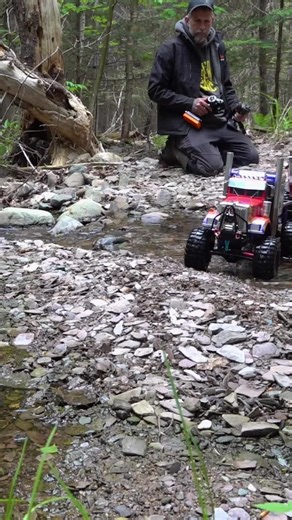 Witness this skilled operator! Dual pistol-grip radios control a triple axle Optimus Prime semi AND another RC truck at once. Rare talent! #RCTrucks #RemoteControl #OptimusPrime #TruckLife #Skills