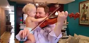 Look how excited this baby gets when his dad plays Bach