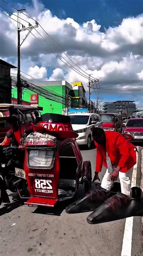 This guy couldn't get into the car because of the big shoes and hat