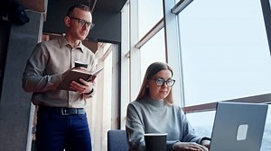 Lady Working Computer Sitting Desk Man Stock Footage Video (100% Royalty-free) 1102477405 | Shutterstock