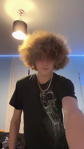 Fluffy Teen with Long Fluffy Hair Takes on an Emo Vibe at 17