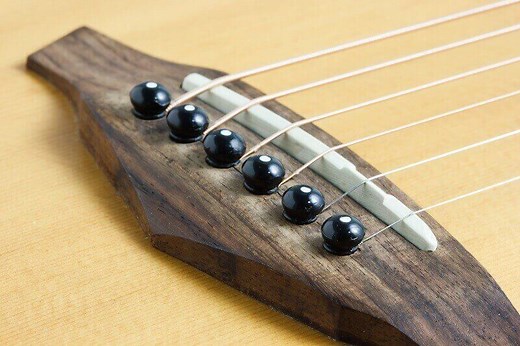 Best Bridge Pins For Acoustic Guitars: Materials & Guide