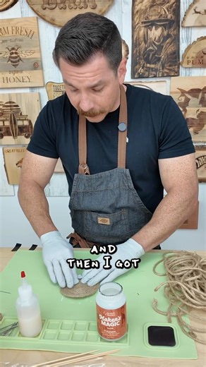 Here’s the secret to gluing jute string without losing your mind! I started by pre-cutting some chunky jute, wrapped it into a spiral, and taped the end with black electrical tape. Not painter’s tape! That stuff? Maker’s Magic will marry it into your project forever. black tape Peels off like a dream. I sealed the front and back, let it dry, touched up the gap, and boom - no fraying, no unraveling. Comment “Magic123” to check out Maker’s Magic for your next coaster project. | Scorch Marker