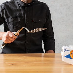 The best grill spatulas easily lifted up to 10 pounds, while flimsier spatulas flexed (and one even stayed permanently bent). Read our review of grill spatulas: https://cooks.io/3g6SzWl | Cook's Illustrated