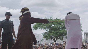 Gay man caned in Indonesia as crowd chants “hit him harder”