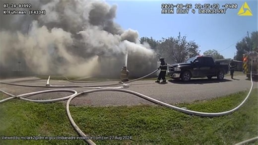 Conservation officer helps save woman from southern Indiana house fire