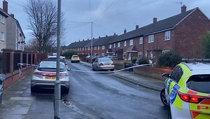 Police cordon off homes as gunshots fired through window