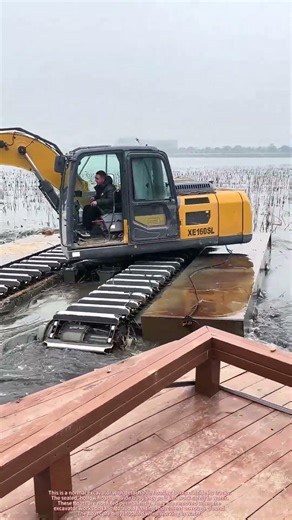 This Excavator Works on Land & Water!