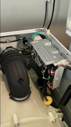 GE front load washer makes clicking sounds