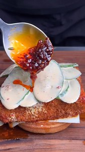 Spicy filet o fish sandwich!!! Order the chilli oils via link in bio!! Ingredients- Fish fillet Salt&pepper Flour Egg wash Panko breadcrumbs (paprika&slt&pepper) X Cucumber Mayonnaise Honey chilli Lime juice Ginger Soy sauce X Spicy mayonnaise- Mayonnaise Honey chilli Lime juice Gherkin Dill Salt&pepper X Melted butter Honey chilli Lime juice Paprika X Cheese Toasted buns . . . . . . . . . . . . . . . . #sandwich #filetofish #chillioil #easyrecipes #dinner | ramanokram