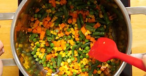 Combine spaghetti and mixed vegetables for a simple signature recipe