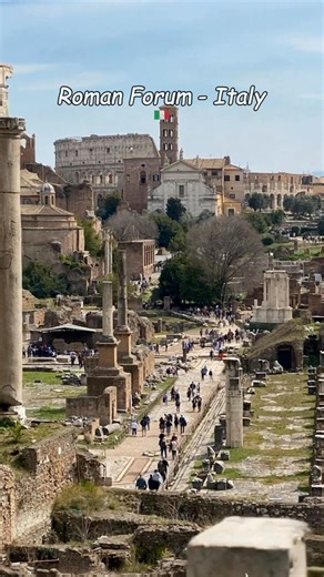 The Roman Forum reveals a path through history, where ruins of temples and columns lead the eye toward the distant, iconic silhouette of the Colosseum. 🏛️📜 | Days in Italy