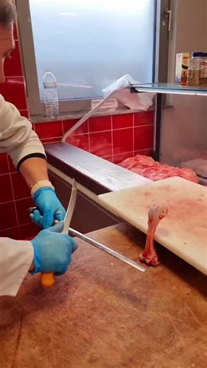Meat Cutting Techniques in a Professional Butcher Shop