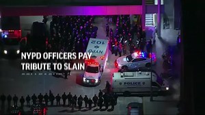 NYPD officers pay tribute to slain colleague