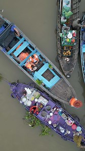 Floating market on Mekong Delta in Vietnam. Popular tourist attraction