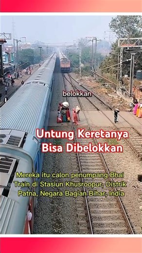 The train suddenly changed tracks while many passengers were passing along the track in front of it.