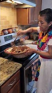 Mole enchiladas with cheese, cream, and chicken #enchiladas #mexicanfood #tortillas #chicken #cre...