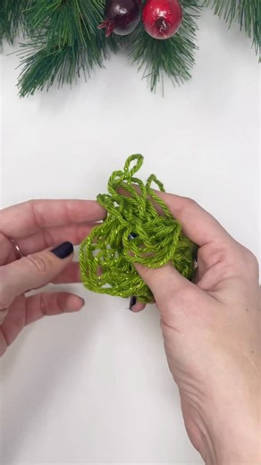 I’ve been crocheting a bunch of these mini wreaths all week because I’m using them for my handmade Christmas cards this year. Come back next week to see how the cards turned out! These mini wreaths are also great to use as gift toppers, or even little ornaments. You can find a free video tutorial over on my YouTube channel. #theknottyboss #crocheter #crochetchristmas #holidaywreath #crochet | The Knotty Boss