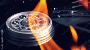 Hard disk failure, computer hdd on fire, burning in flames, data loss and computer technology crash concept.