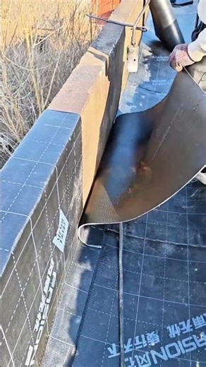Installing a Waterproof Layer on the Edge of the Building Roof