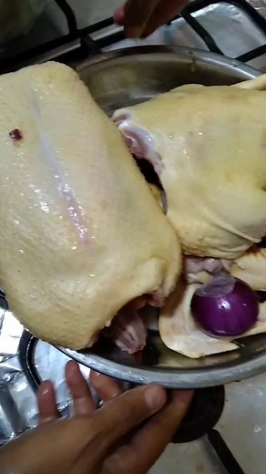 Cooking Chicken: Simple Boiling Method in Kitchen