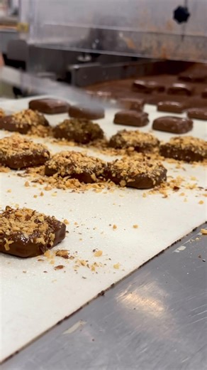 17K views · 79 reactions | Come behind the scenes in our Vermont chocolate factory as we handcraft a batch of our Almond Butter Crunch! This decadent toffee has been a fan-favorites for more than 35 years! #almondbuttercrunch #englishtoffee #behindthescenes #howitsmade #insidethechocolatefactory #makeitextraordinary | Lake Champlain Chocolates | Facebook