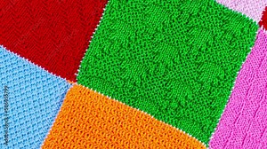 Knitted background. Knitted texture. A sample of knitting from wool. Knitting Pattern.