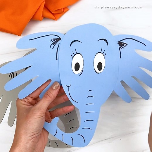 HANDPRINT HORTON CRAFT - Recreate Horton from Dr. Seuss's book with this fun craft! Get the template here: https://www.simpleeverydaymom.com/horton-hears-a-who-handprint-craft/ | Simple Everyday Mom