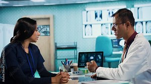 Physician meeting with patient to discuss medical test results in cabinet, using advanced diagnostic tools to interpret x ray scans, demonstrating a professional healthcare approach. Camera B.