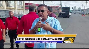 Briton John won the 23rd annual Cheddi Jagan Memorial 55-mile cycle race in Berbice, surviving several attacks on his journey to victory. Andrew Carmichael reports… | Television Guyana Inc.