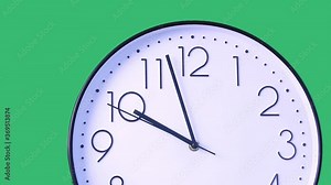 Footage of white classic wall clock, face beginning of time 09.55 am or pm, clock minute walk slowly,but it's time to hurry. Isolated on green background. Time, lifestyle, haste concept.