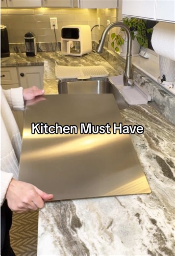 You’ll find yourself using this stainless steel board all the time. It’s great for food prep because the non porous surface makes it easy to work on and easy to clean. #stainlesssteelcuttingboard #cuttingboard #kitchenessentials #kitchengadgets #kitchenhacks