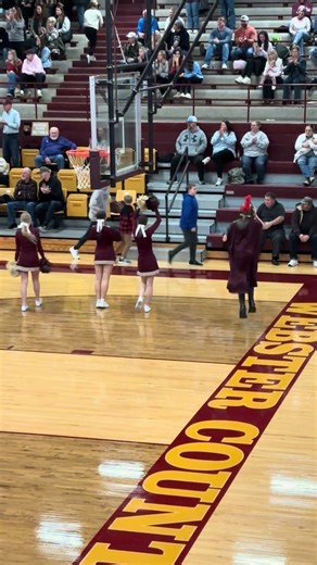 Mascot doing dance moves with the cheerleaders shorts#￼￼