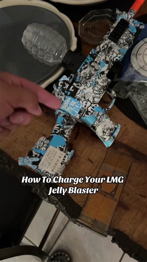 How to chsrge your LMG Jelly Blaster…All you got to do is take the battery out the back and connect it itll glow solid green when its done! #gelblaster #gelblasters #orbeez #gelblasterusa