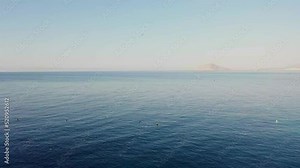 Seagulls Flying Over The Mediterranean Sea Near The Calpe, Spain. - aerial