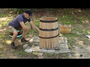 Constructing a beer barrel with hand tools.