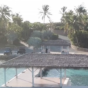Drone footage off the coast of Jeffrey Epstein's home in the U.S. Virgin Islands shows structures on Little Saint James island and security officers walking on the dock. https://abcn.ws/31B0ZuD | ABC News