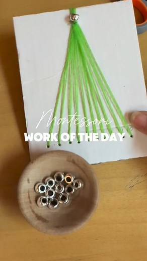 Montessori Work of the Day Sewing 🧵🪡 The 10 Tree™️ (A Tiny Cabin Montessori Original 😘) Age: 3 years and up Prepare the Environment: • cardboard rectangle • blunt embroidery needle • green embroidery thread • a shiny pony bead • equilateral triangle shape with 10 numbered holes on the bottom and 1 big hole punch hole on the top Why: Sewing strengthens, pincer grasp, fine motor skills and focus. The added 1-10 portion brings numeric awareness between both quantity and symbol, while conceptuall
