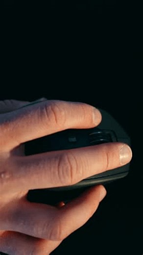 clip-3992722721-using-computer-mouse-on-black-background