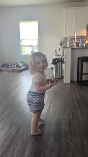 Help me out here. I don't know this to be a sign of Potty Training....buuuuttt.....baby girl will pause, look at her diaper, and then go about life she pauses. I stopped this weekend and consistently watched her. she is peeing or pooping after she stops and looks. I thought that this may be a sign of Potty training but I can't find any research to support this. I don't want to push her into potty training too early but I'm not sure if she is telling us that she is ready. she can say 'pee poop' s