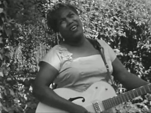 Sister Rosetta Tharpe performing “His Eye Is On The Sparrow” in 1960. | Dust-to-Digital