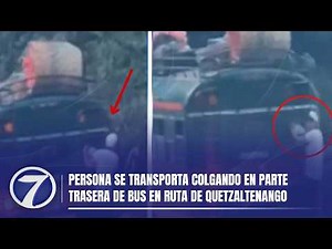 Person transported hanging from the back of a bus on a route to Quetzaltenango