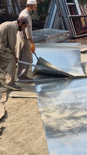 Giant Scissors Cutting Metal