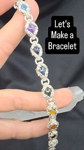~○●○~{Chakra Orbit Bracelet}~○●○~ Sleek, smooth, comfortable, and colorful. Looking for a wrist to adorn. Check out our website, link in our bio. If youre looking for a new style of wrap to try out, we got a tutorial on this as well. Get the full Bracelet tutorial and also learn how to make a ring and pendant for the cost of 1 tutorial. All tutorials are on our website: https://craftyfingas.com/tutorials #wirewrap #jewelry #bijoux #joyeria #joias | CraftyFingas