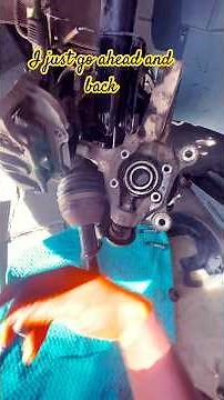 Step-by-Step Guide: Installing Wheel Bearings on a Chrysler Town and Country #diy #shorts