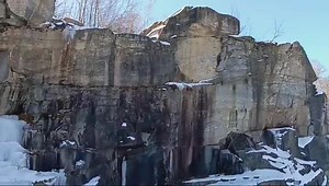 The Bowe Quarry originally opened in 1890 being the first in Otis, then was reopened about 1920 by a group of men of Finnish men, and was thereafter known as the "Finn's Quarry." Officially it was "Chester Granite and Polishing Works." Since the rails to it had been taken up and sold for scrap during the war, the new company used trucks. At first they trucked their stone only as far as the siding at Turner's Switch, the right to erect a derrick there was granted them by the District Court in 192