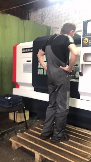 CNC Machine Operation in an Industrial Workshop