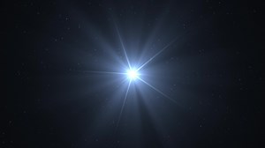 Optical glare effect on a black background. Cinematic light. The sun in space